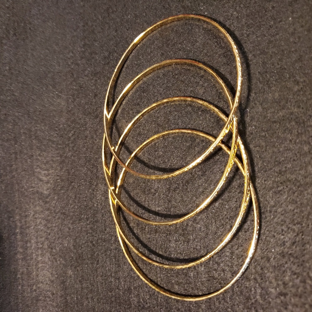 Bangle Gold Tone Swirls